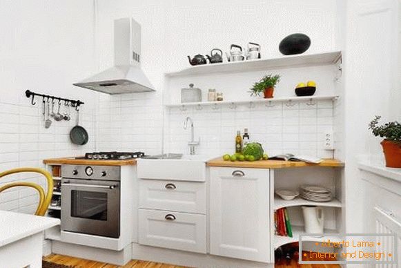 Фото необычного інтерьера кухні в белом цвете